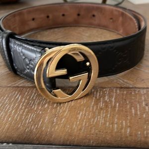 Authentic Gucci Belt- black & gold interlocking G & G logo on belt